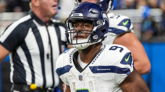 Seahawks Kenneth Walker Iii Somersaults To 1st Down In Incredible Wallpaper