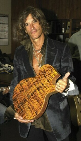 Played Guitar On Alice Cooper S Song House Of Fire