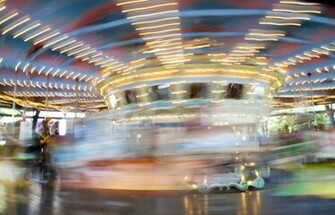 Merry Go Round In Motion Blurred Abstract Form Of A