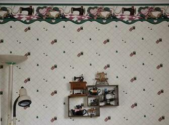 The Far Wall With A Display Of Sewing Machine Music Boxes