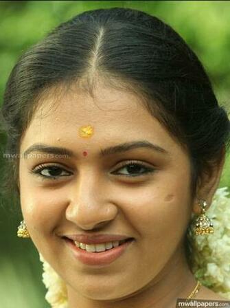 Lakshmi Menon Cute HD Photos 1080p With Image