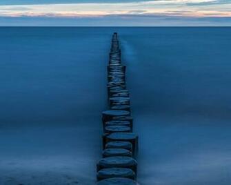 Wallpaper Beach Wooden Poles Separator