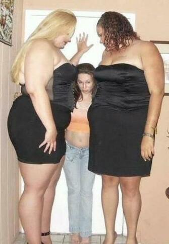 Of A Small Girl And Couple Very Large Girls Those Two Big