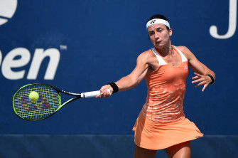 Anastasija Sevastova Dominating The Court In Peach Tennis Wallpaper