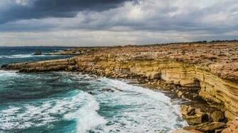 Wallpaper Cyprus Cliff Coast Waves Full HD