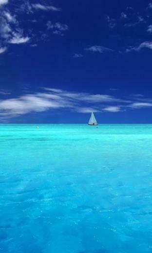 Sailing Boats In Deep Blue Sea