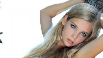 Sienna Leaning On A Tree Portrait Wallpaper Girl