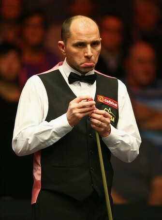 Joe Perry Of England Looks On During His First Round Match