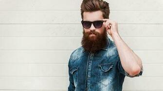 Handsome Man With A Beard In Black Glasses Desktop Wallpaper