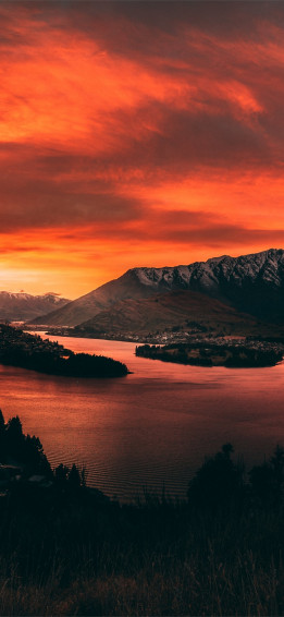 Body Of Water Near Mountains iPhone Wallpaper