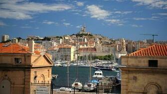Port On The Background Of A Hill In Center