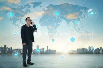 International Business Concept With Businessman On City Skyline