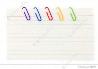 Office And Close Up Colorful Paper Clip With Notepaper Stock