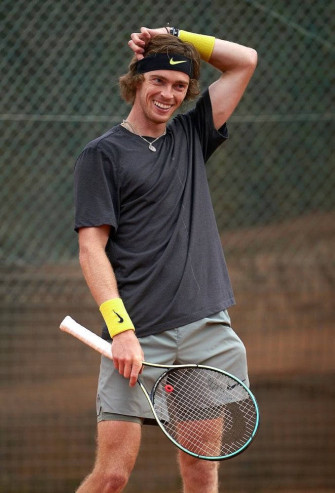 Andrey Rublev With Championship Trophy Wallpaper