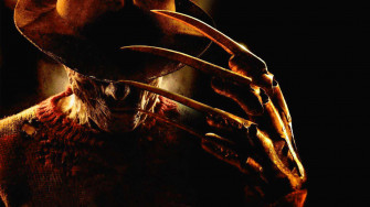 Freddy Krueger Standing In A Dark Alley Wallpaper
