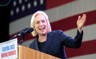 Kirsten Gillibrand Extending Left Hand Wallpaper
