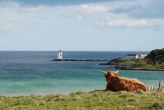Kilnaughton Bay And Carraig Fhada Lighthouse Islay Image Wallpaper