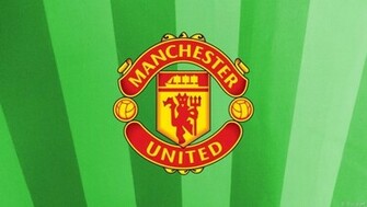 Green Striped Manchester United Wallpaper With The Logo In Center