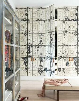 Contemporary Dressing Room With Wallpapered Wardrobes And Bench