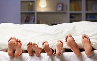 Feet Sticking Out From Under The Blanket Mystery Wallpaper