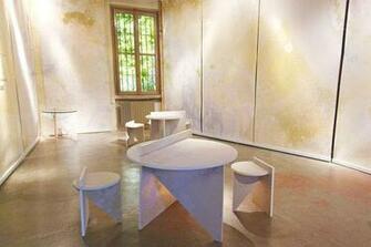 Calico S Inverted Spaces Wallpaper Draped In The Background And