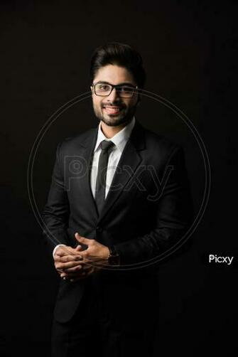 Image Of Portrait Indian Male Businessman Standing Against