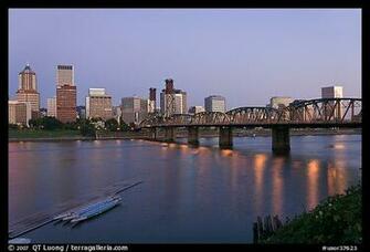 Williamette River And Portland Skyline At Night Oregon Usa