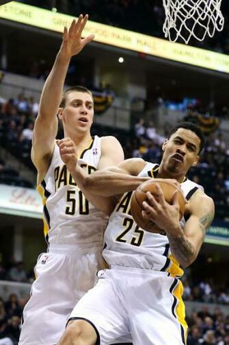 Gerald Green Pulls Down A Rebound With Teammate Tyler