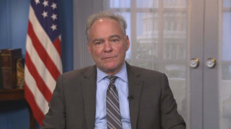 Influential Figure Tim Kaine In A Professional Gray Suit Wallpaper