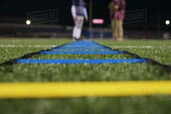 Agility Ladder On Grassy Field At Stadium With American Football