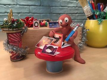 Morph Festive Tunes In The Background And A Stack Of
