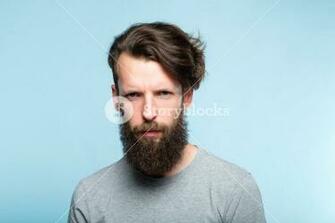 Serious Frowning Man With A Troubled Look And Gathered Brows