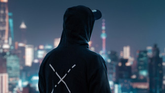 Hoodie Man Looking At City 4k Laptop Full HD 1080p Wallpaper Image