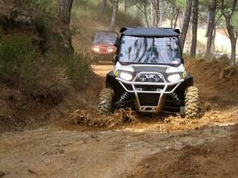Polaris Side By Atv Crossing Mud Bog At The Speed