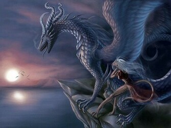 Dragon Sitting On The Rocks Desktop HD Wallpaper