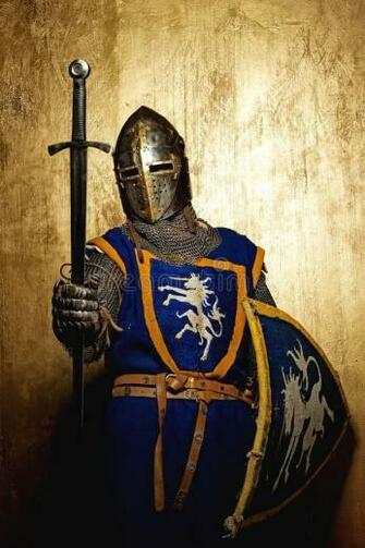 Medieval Knight Holding Sword In His Hand On