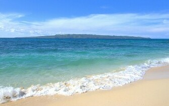 Tropical Ocean Wallpaper With A Distant Island Sight