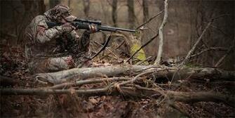 Camo Hunting Gloves Hats Clothes Hunter In Woods Shooting Deer