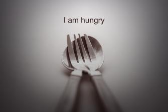 Fork And Spoon On White Background I Am Hungry Concept Tenet