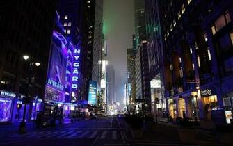 Shop Street At Night Of New York City Wallpaper