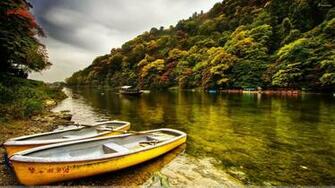 Yellow Boats Side Of The River Wallpaper