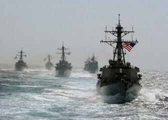 Us Navy Ships At Sea Background Background Wallpaper