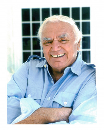Iconic Actor Ernest Borgnine In A Blue Shirt Wallpaper