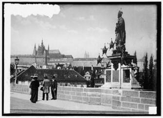 Germany Prague Statue To Patron Saint Cathedral In Background