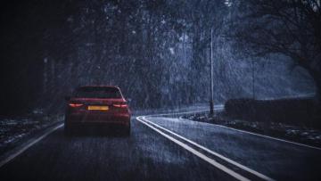 Red Car On Road While Raining Photo London Image