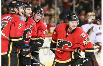 Calgary Flames Captain Mark Giordano Second From Left Celebrates