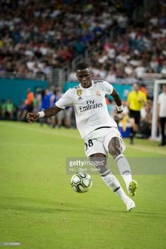 Vinicius Junior Of Real Madrid Kicks The Ball To Keep Control