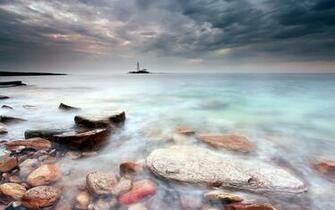 Calm Sea Under The Stormy Sky Wallpaper