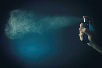 Fragrance Spray Blue Background Ad PhotoHDx