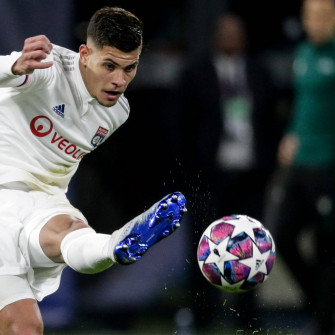 Bruno Guimaraes Delivers A Powerful Kick During Football Wallpaper